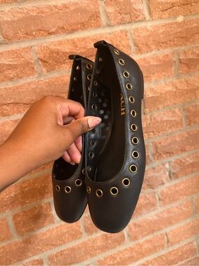 Coach Black Leather Ballet Flats with Gold Grommet Trim